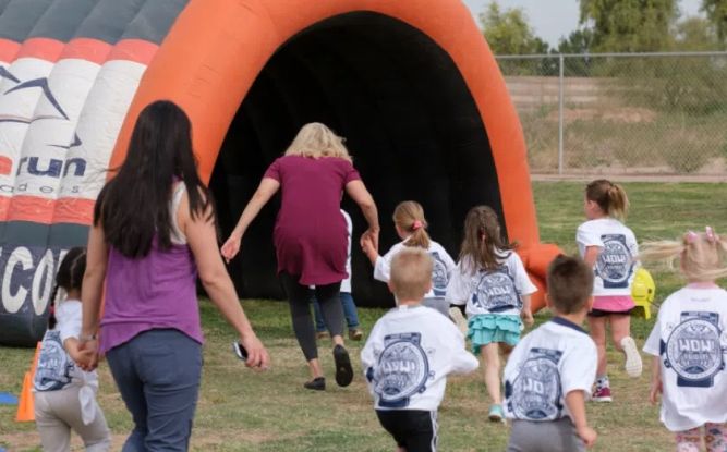 Apex Franchise leaders excorting kids for play