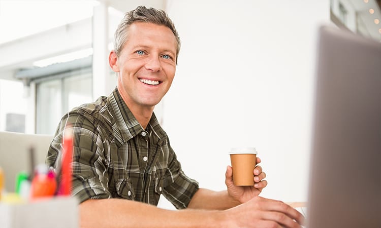 Man holding a coffee cup