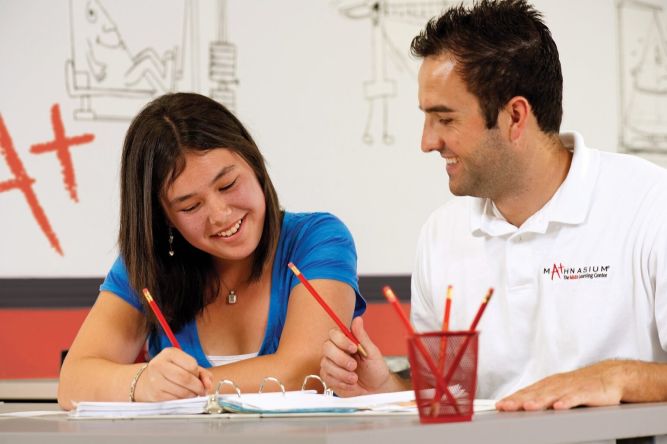 Mathnasium Franchise student & teacher working on math skills