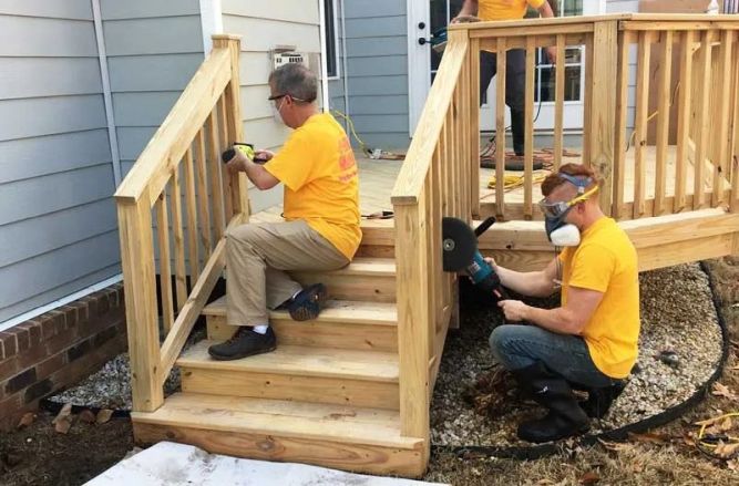 Deck Medic Franchise workers installing a deck