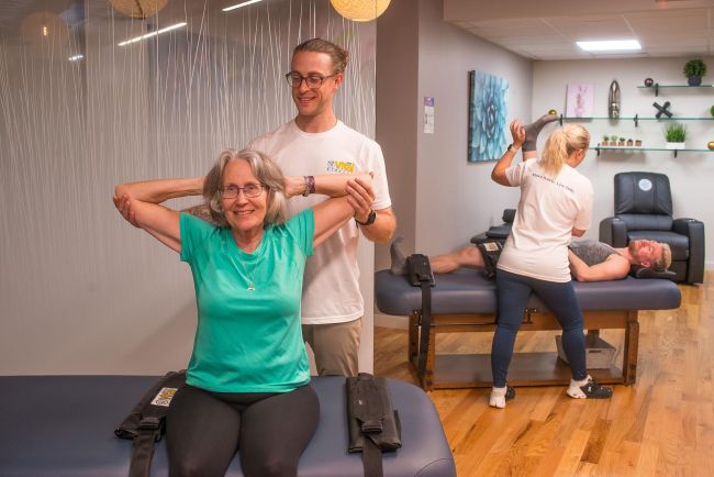 The Vital Stretch Franchise Studio client stretching