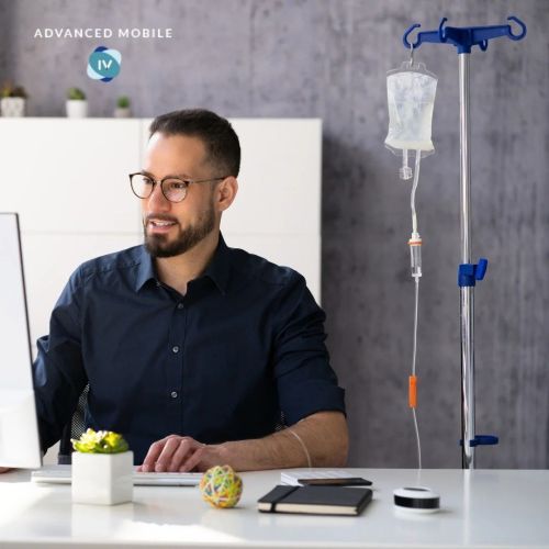 Advanced Mobile ID client receiving IV therapy while at work.