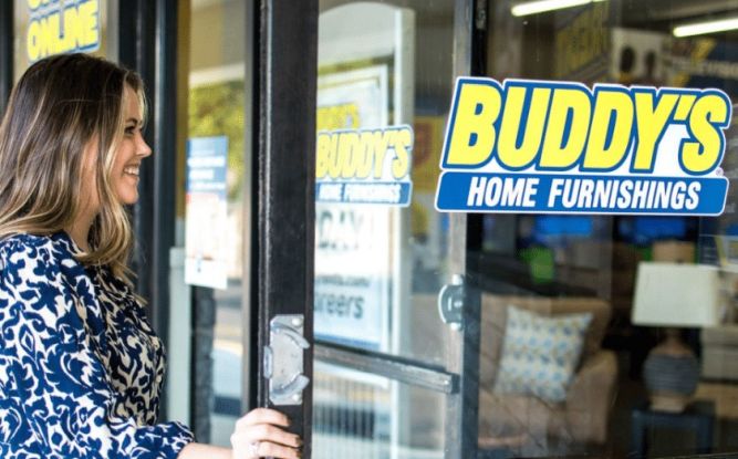 Buddy's Home Furnishings Franchise customer entering the store. 