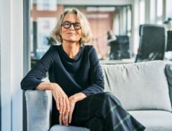 Senior Business woman showing her successful stature