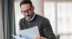 A Business professional reviewing franchise documents