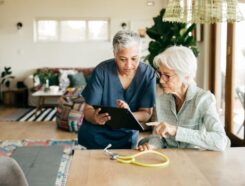 The Care Concierge Franchise owner discussing care with patient.