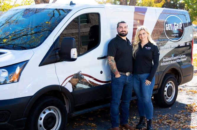 Get a Grip Franchisees standing by their van